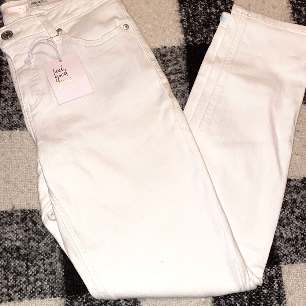 LC skinny jeans with distressed knee detail!